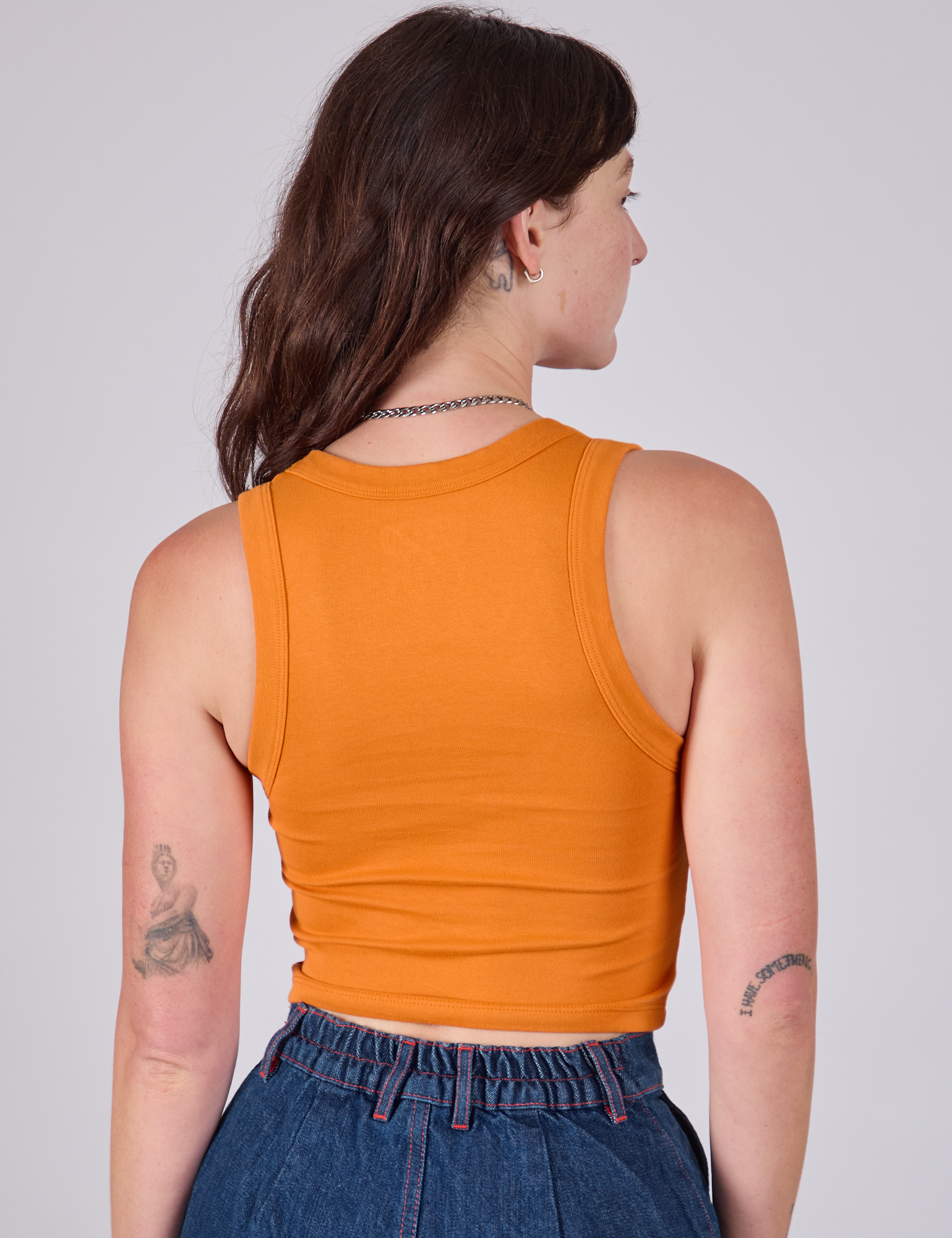 Cropped Tank Top in Creamsicle Orange back view on Alex