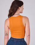 Cropped Tank Top in Creamsicle Orange back view on Alex