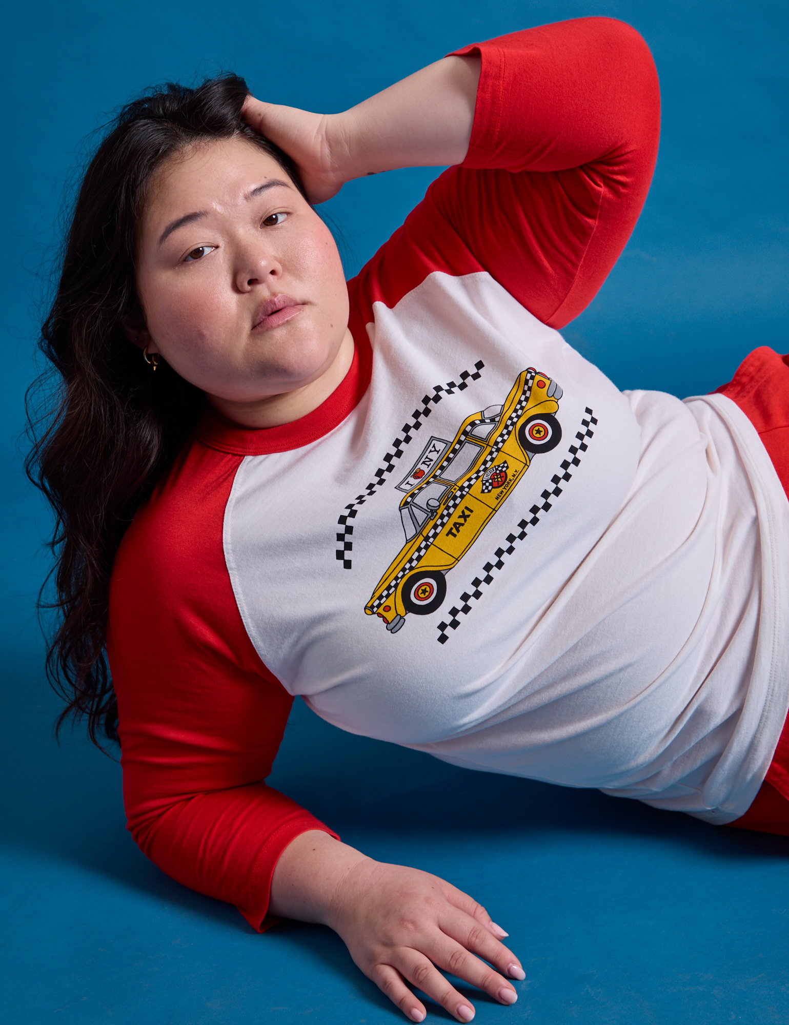 Ashley is wearing Taxi Raglan Tee in NYC
