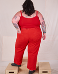 Back view of Mid-Rise Work Pants in Mustang Red and matching Cropped Cami on Sam