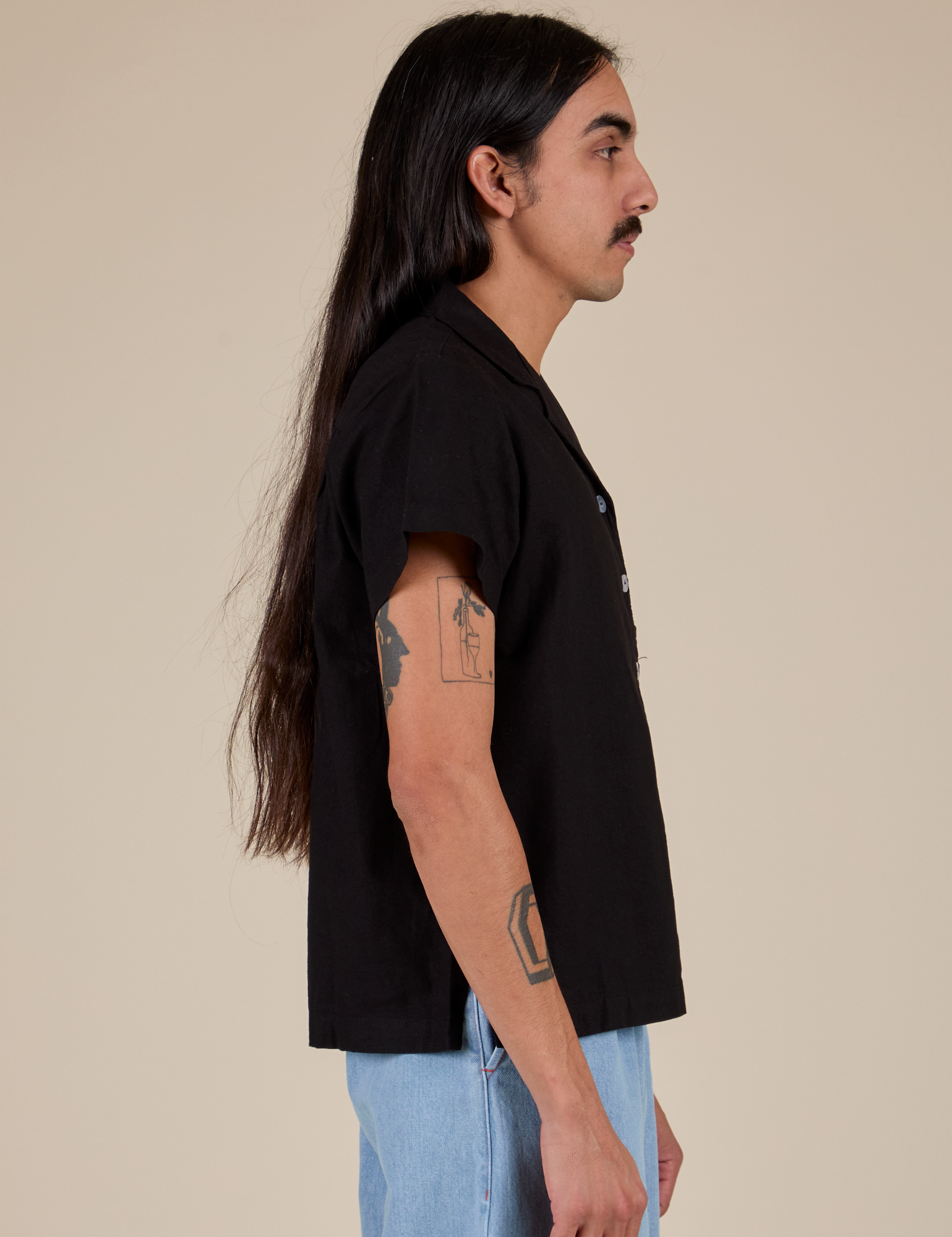 Pantry Button-Up in Basic Black side view on Anthony