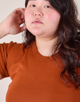 Baby Tee in Burnt Terracotta neckline close up on Ashley