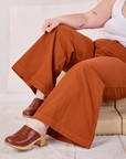 Bell Bottoms in Burnt Terracotta pant leg close up on Ashley