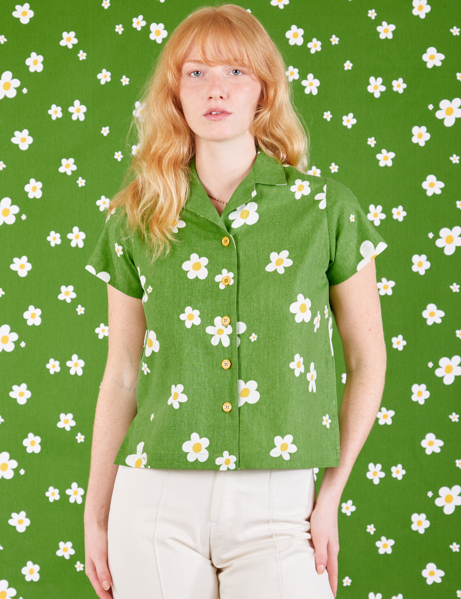 Margaret is wearing Pantry Button-Up in Bob Baker Flower