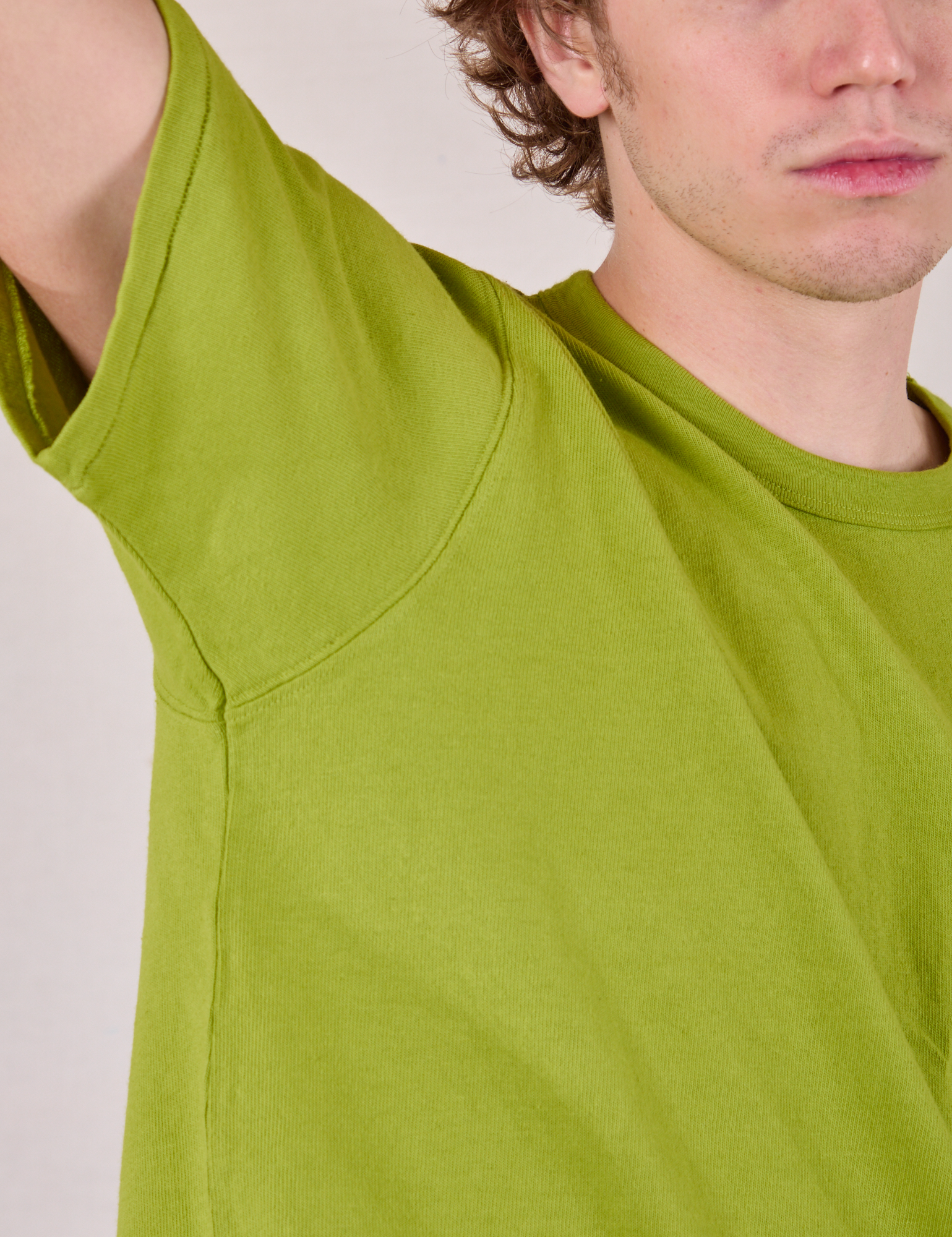 Burly Tee in Gross Green close up on Quinn