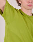 Burly Tee in Gross Green close up on Quinn