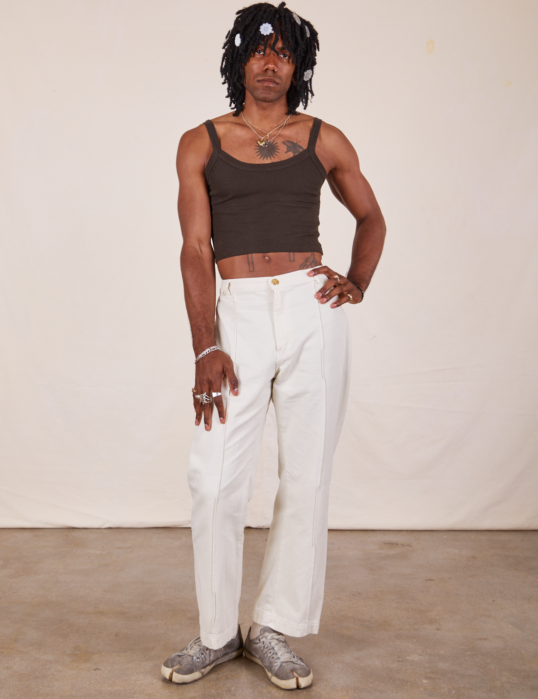 Jerrod is wearing Cropped Cami in Espresso Brown and vintage off-white Western Pants