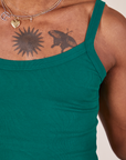Front close up of Cropped Cami in Hunter Green worn by Jerrod