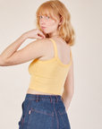 Cropped Cami in Butter Yellow angled back view on Margaret