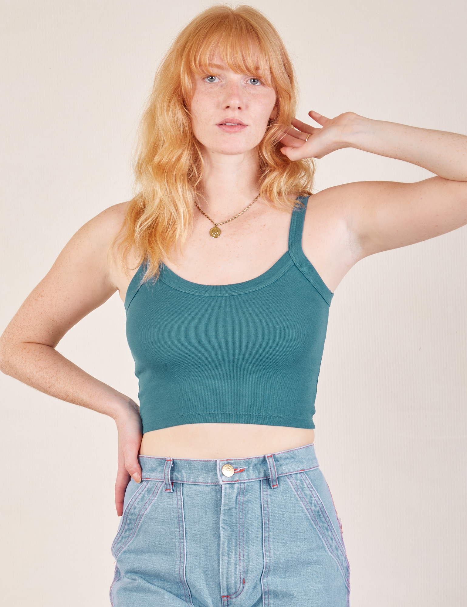 Margaret is wearing Cropped Cami in Marine Blue