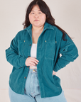 Ashley is wearing Corduroy Overshirt in Marine Blue and light wash Denim Trouser Jeans