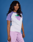 Angled front view of Produce Raglan Tee in Grape on Kandia
