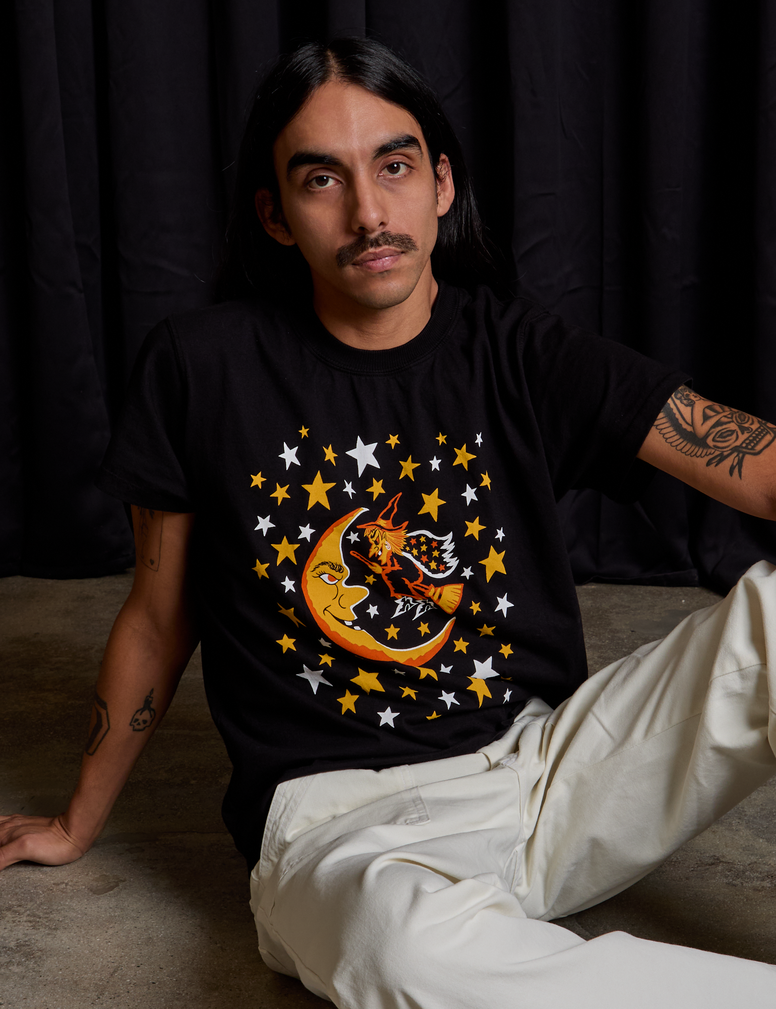 Anthony is wearing Vintage Tee in Moon &amp; Witch