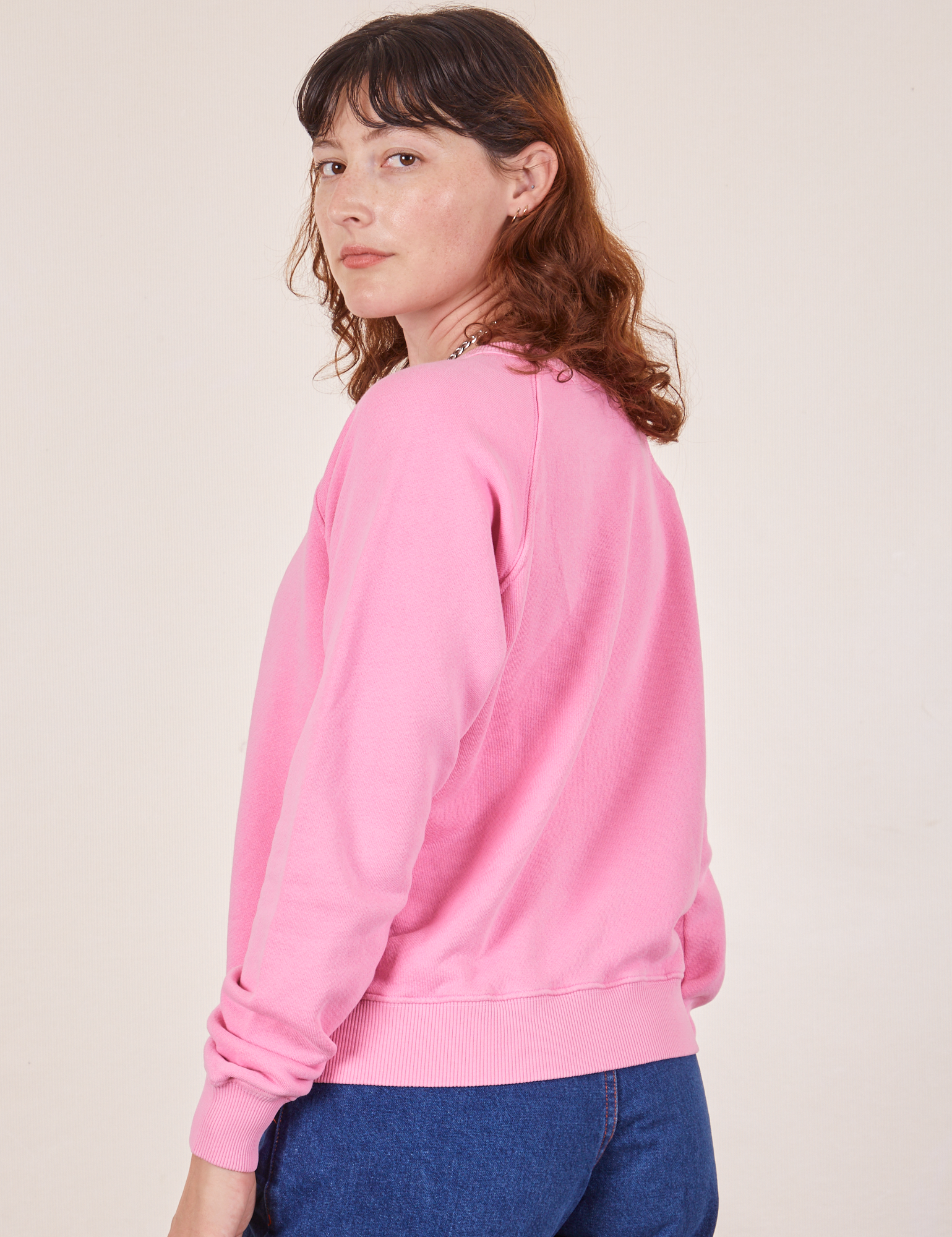 Angled back view of Heavyweight Crew in Bubblegum Pink on Alex
