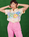Tiara is wearing Pantry Button-Up in Lace Airbrush tucked into bubblegum pink Western Pants