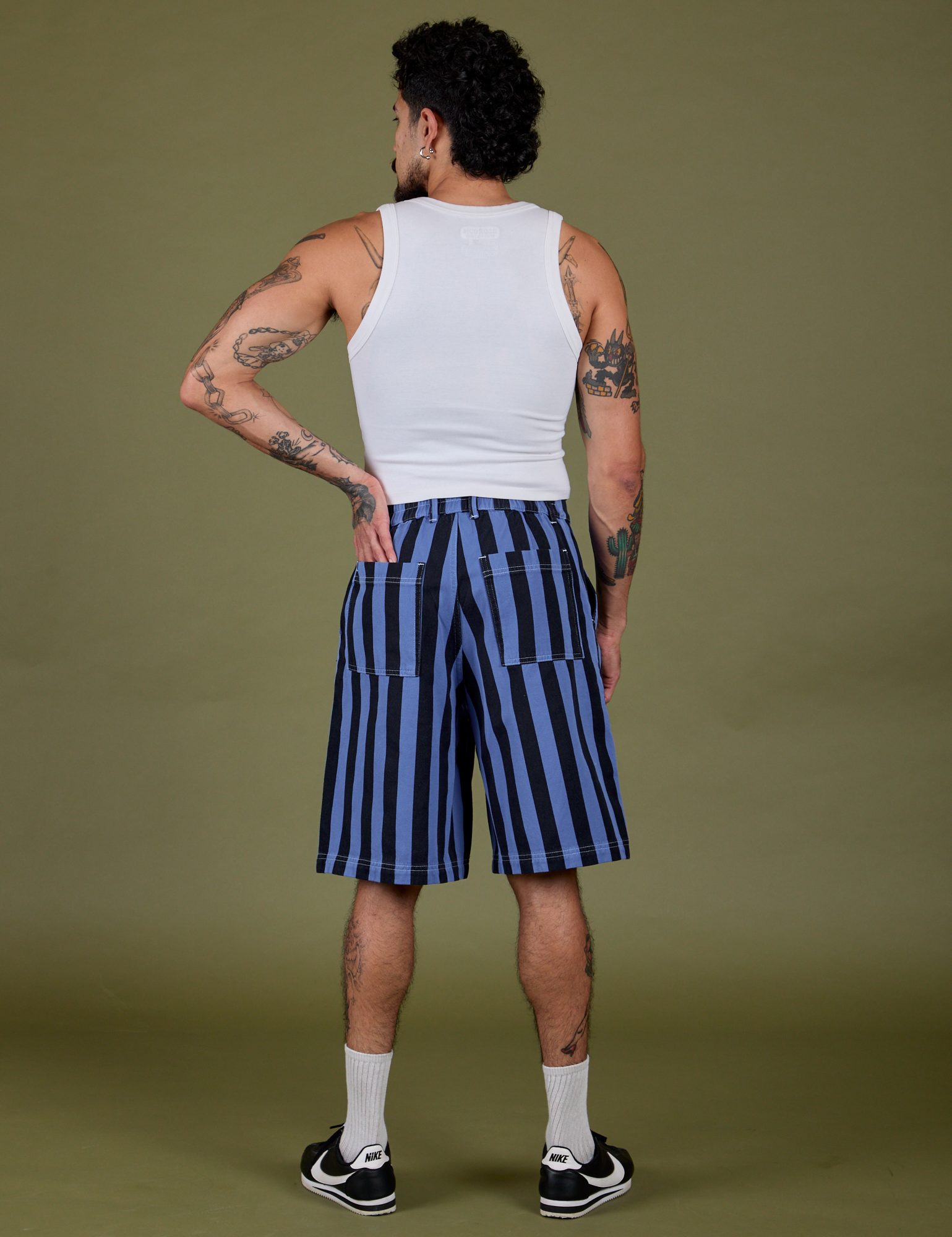 Back view of Longline Work Shorts in Cornflower and vintage tee white Cropped Tank on Jesse