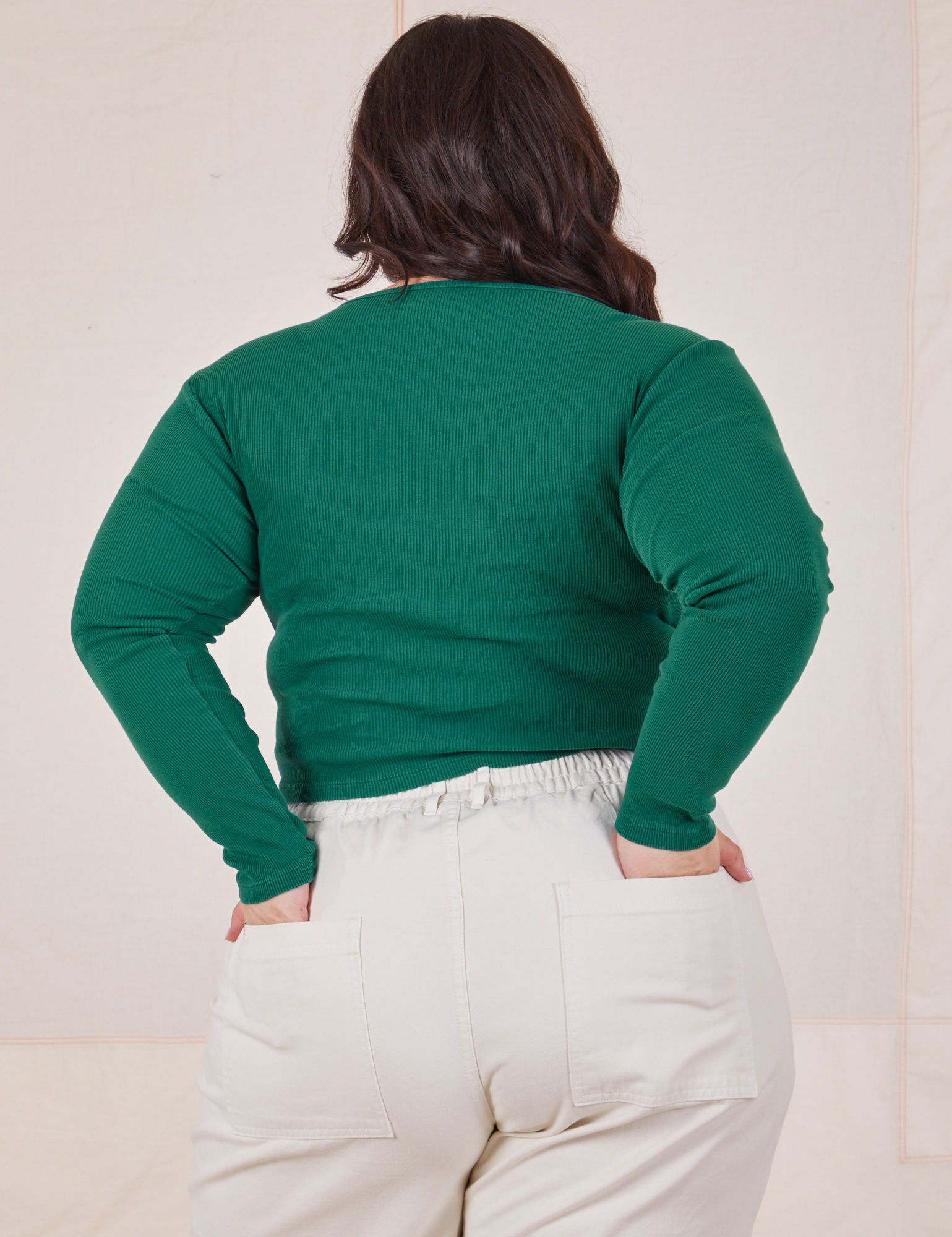 Back view of Long Sleeve V-Neck Tee in Hunter Green worn by Ashley
