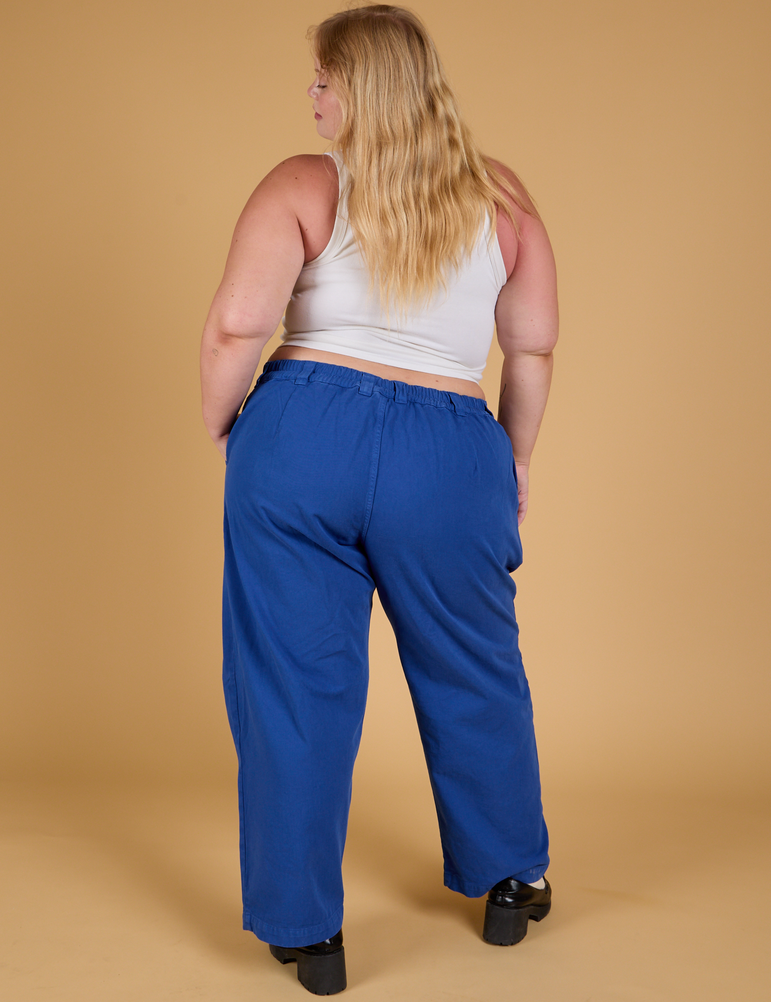 Baggy Mid-Rise Trousers in Royal Blue back view on Juliet