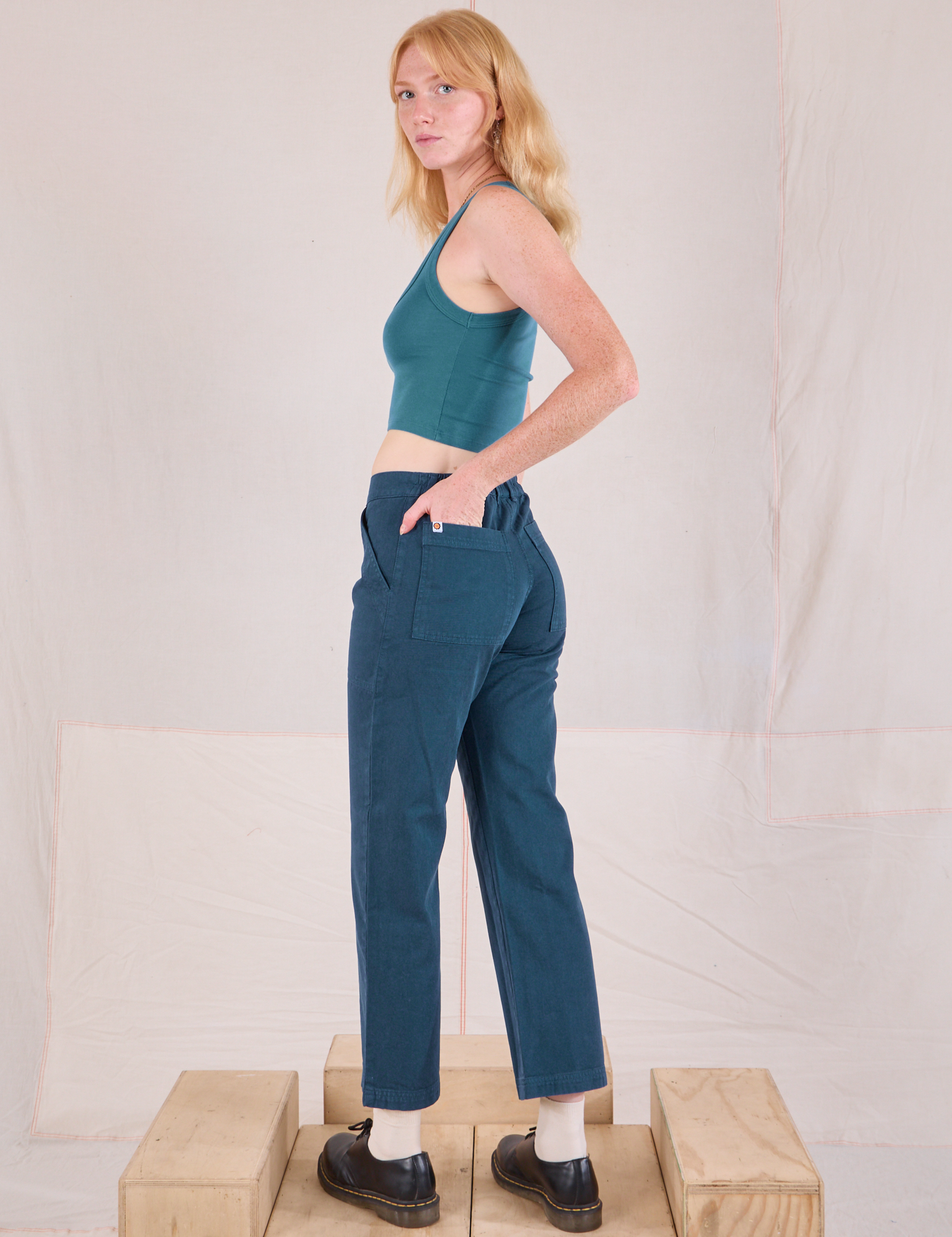 Mid-Rise Work Pants in Lagoon angled back view on Margaret