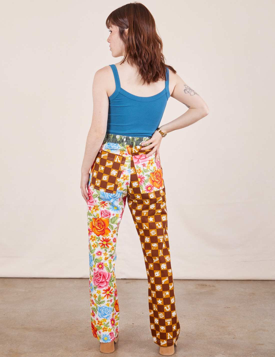 Back view of Mismatched Print Work Pants and marine blue Cropped Cami worn by Hana