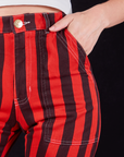 Black Stripe Work Pants in Mustang Red front pocket close up on Alex