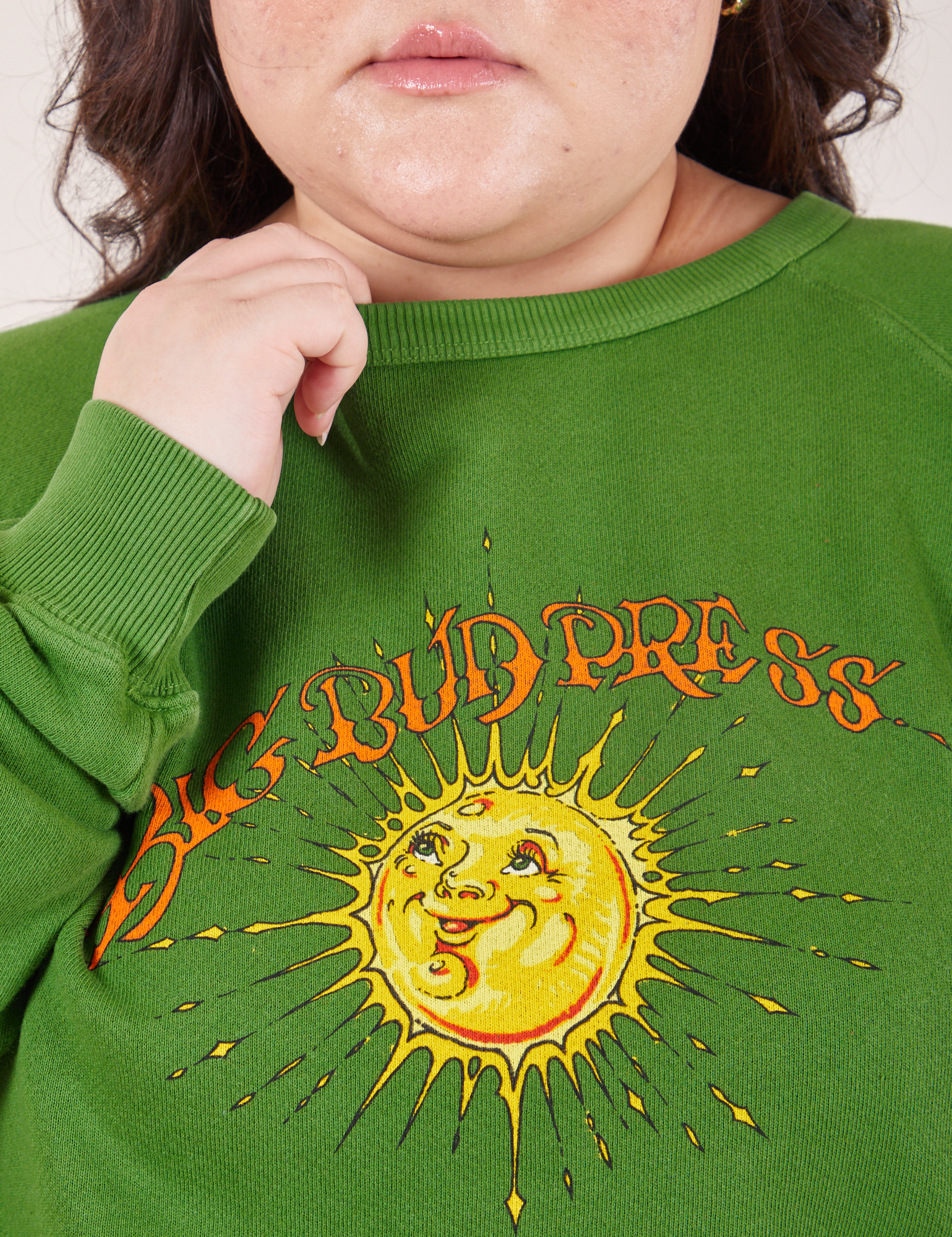 Bill Ogden&#39;s Sun Baby Crew in Lawn Green front close up on Ashley