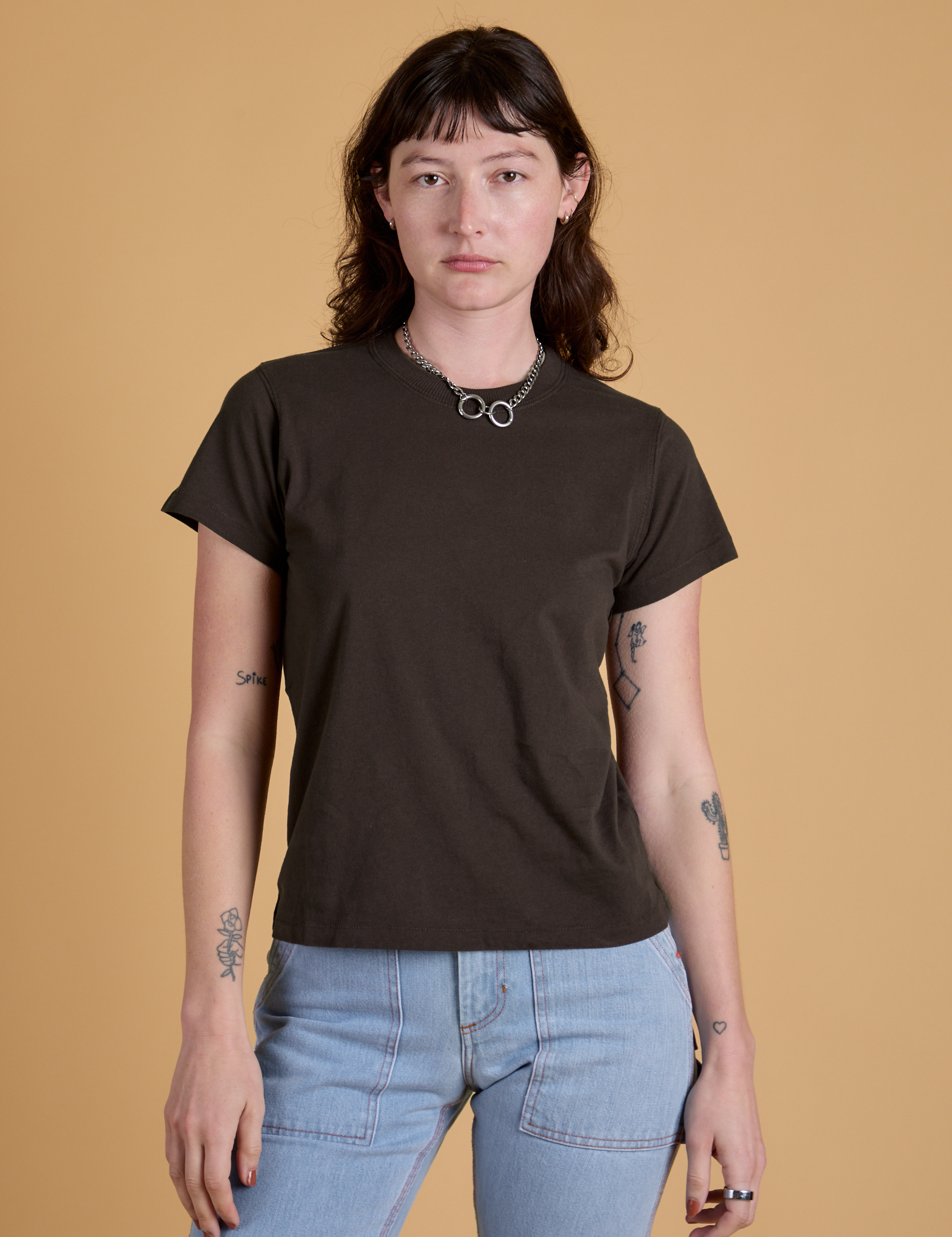 Alex is 5’8” and wearing P Organic Vintage Tee in Espresso Brown
