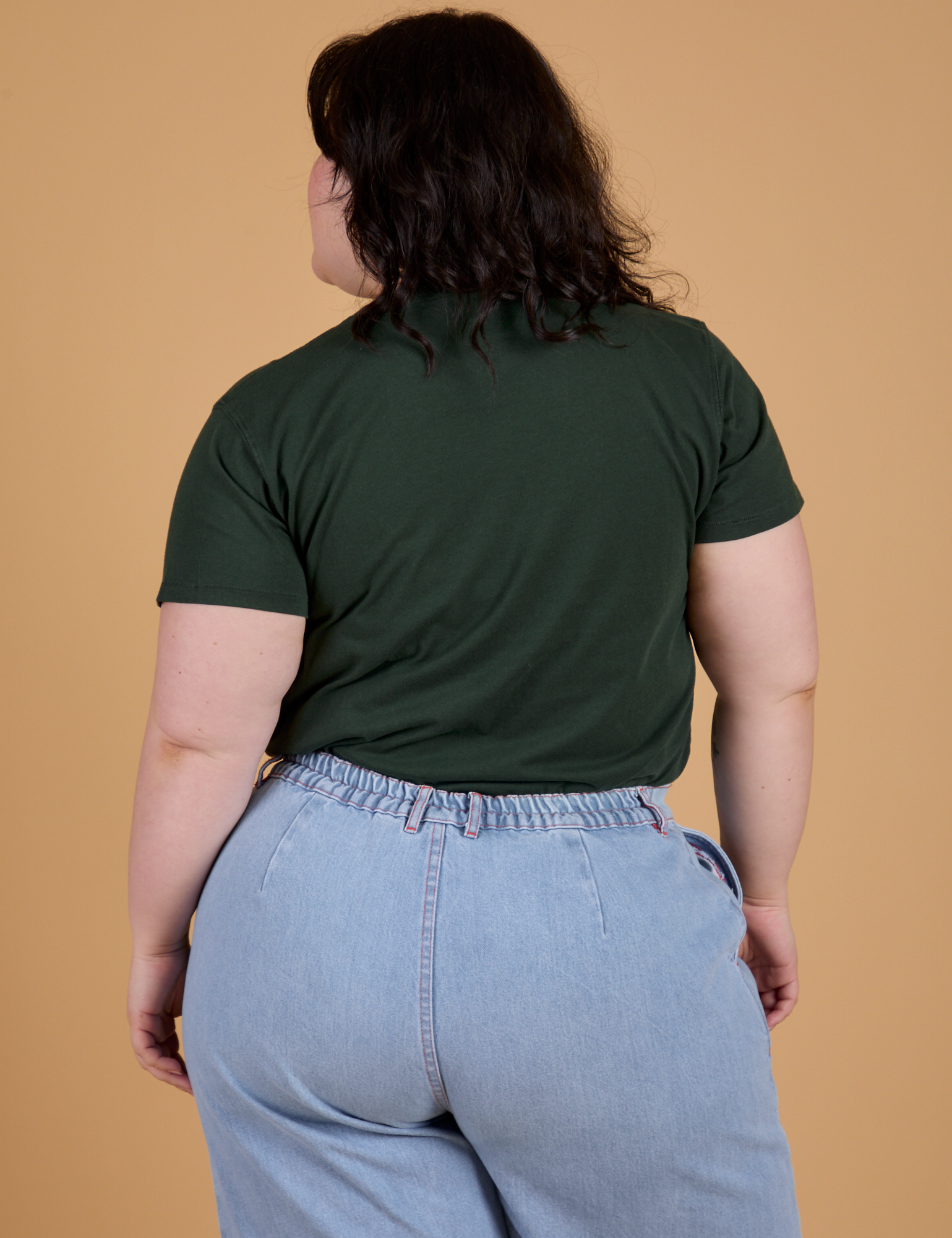 Organic Vintage Tee in Swamp Green back view on Ashley