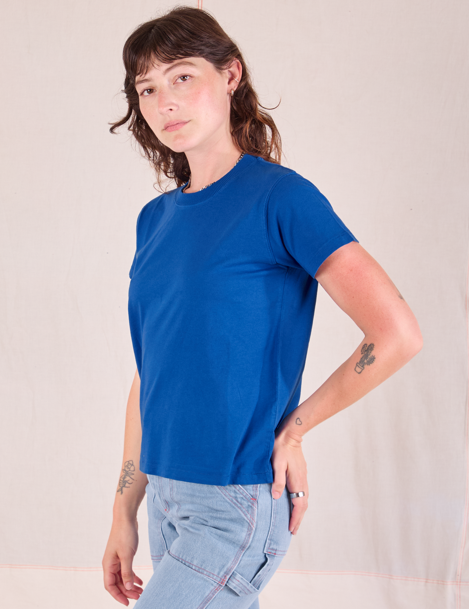 Organic Vintage Tee in Royal Blue angled front view on Alex