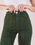 Organic Work Pants in Swamp Green front close up on Alex