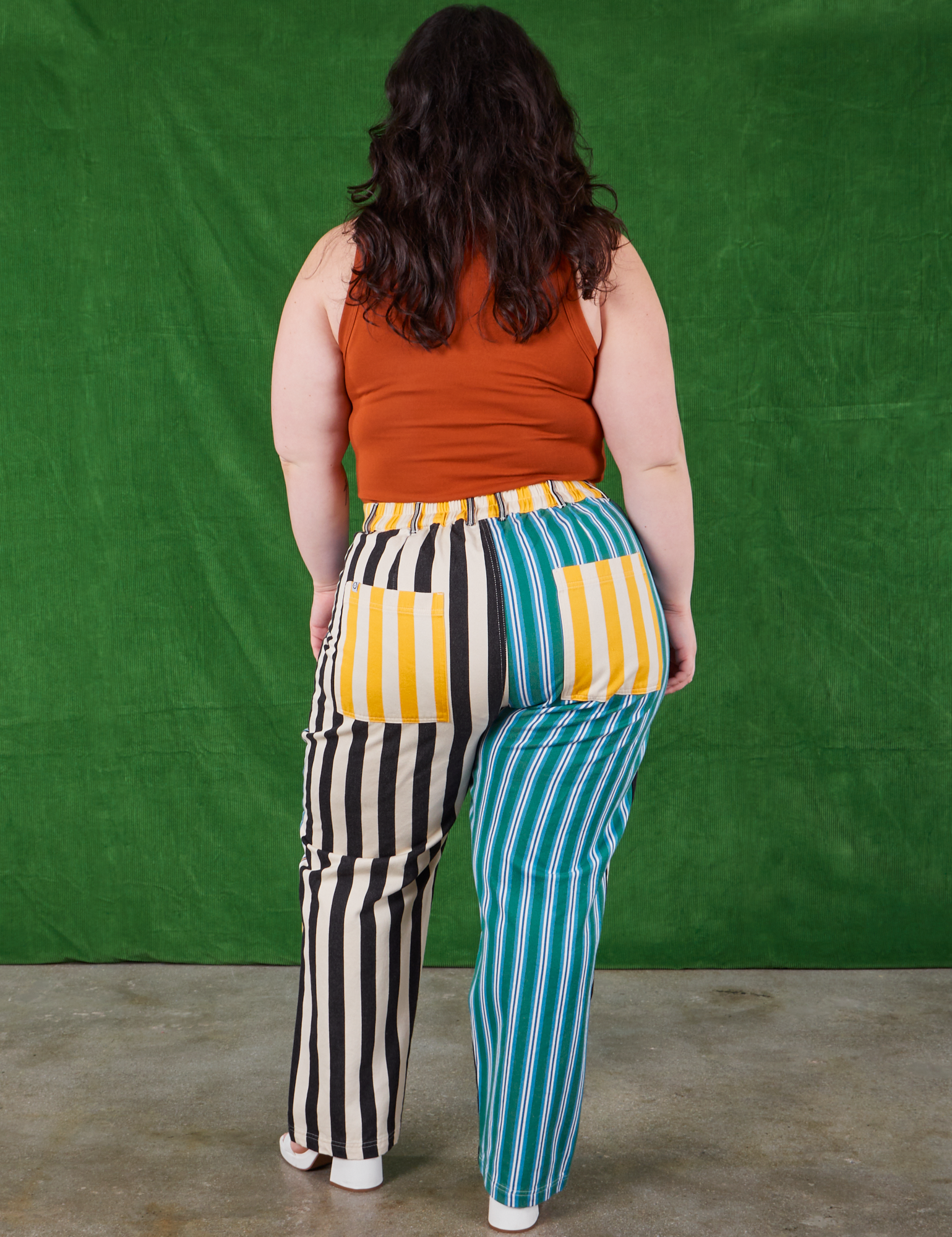 Back view of Mismatched Stripe Work Pants and burnt terracotta Cropped Tank Top on Ashley