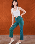 Alex is 5'8" and wearing XS Overdye Stripe Work Pants in Blue/Green paired with vintage off-white Cropped Tank Top