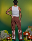 Back view of Paintstamped Work Pants in Mushroom and Cropped Tank in Vintage Tee White on Jesse