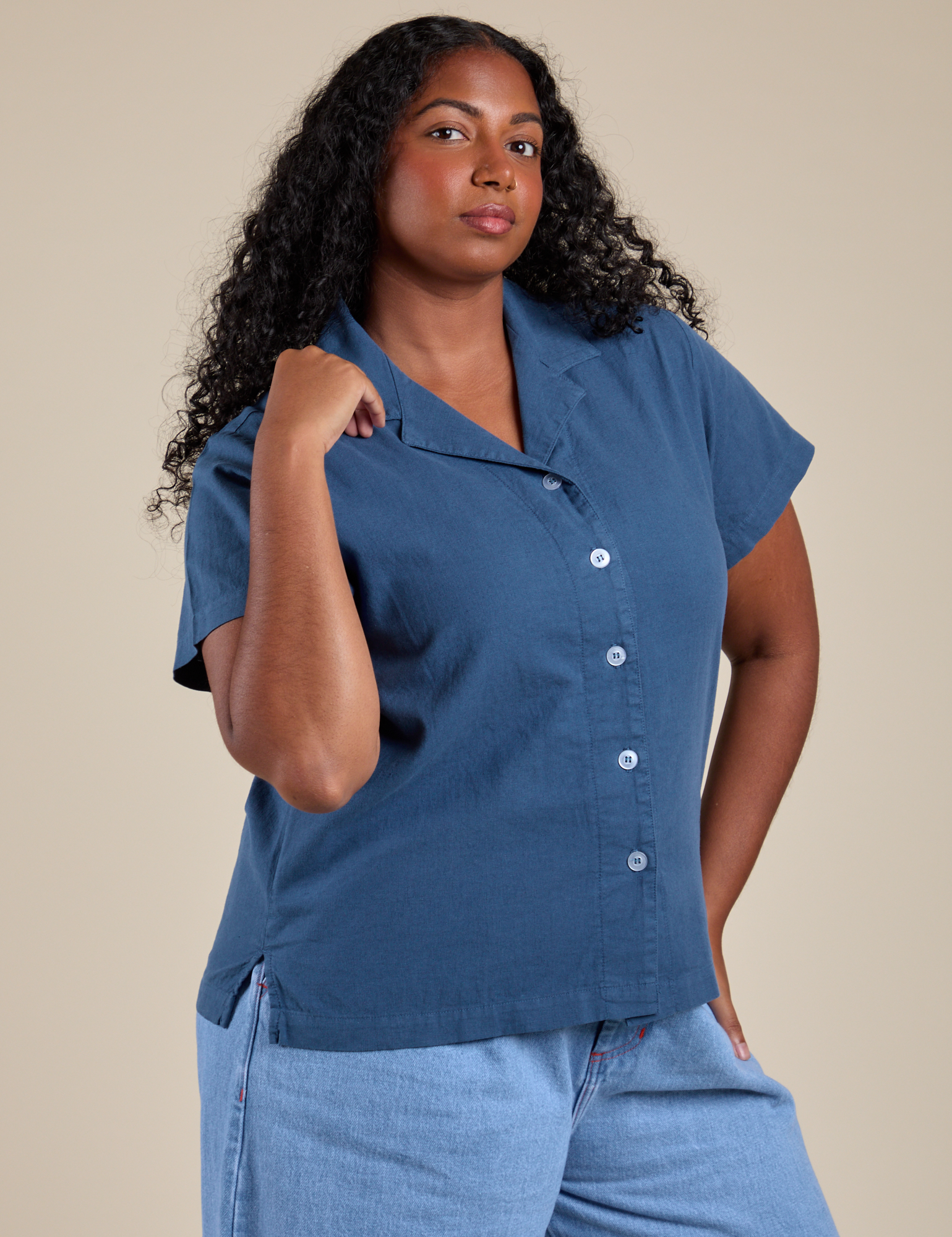 Angled front view of Pantry Button-Up in French Blue on Meghna