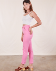 Side view of Pencil Pants in Bubblegum Pink and vintage off-white Cami