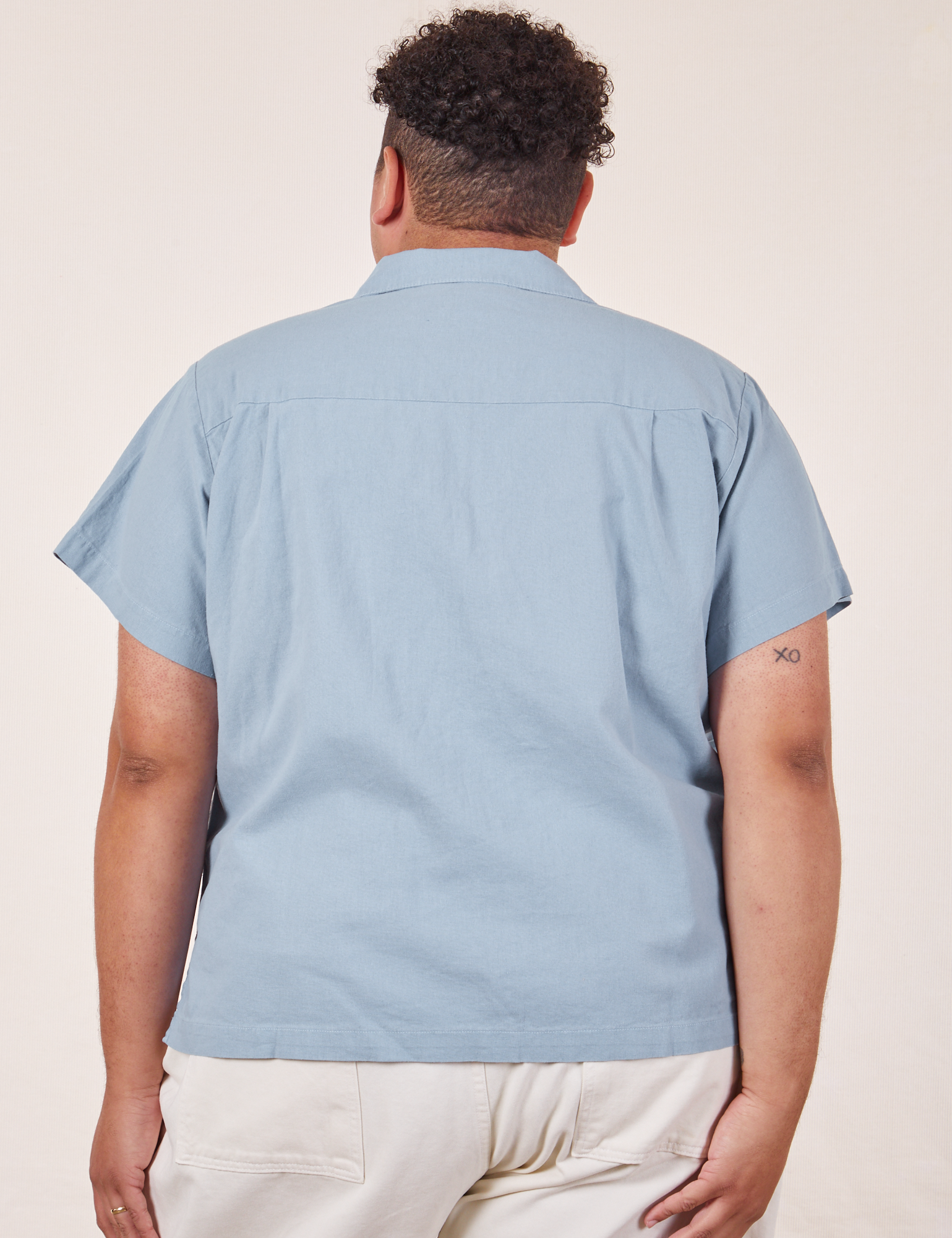Back view of Pantry Button-Up in Periwinkle on Miguel