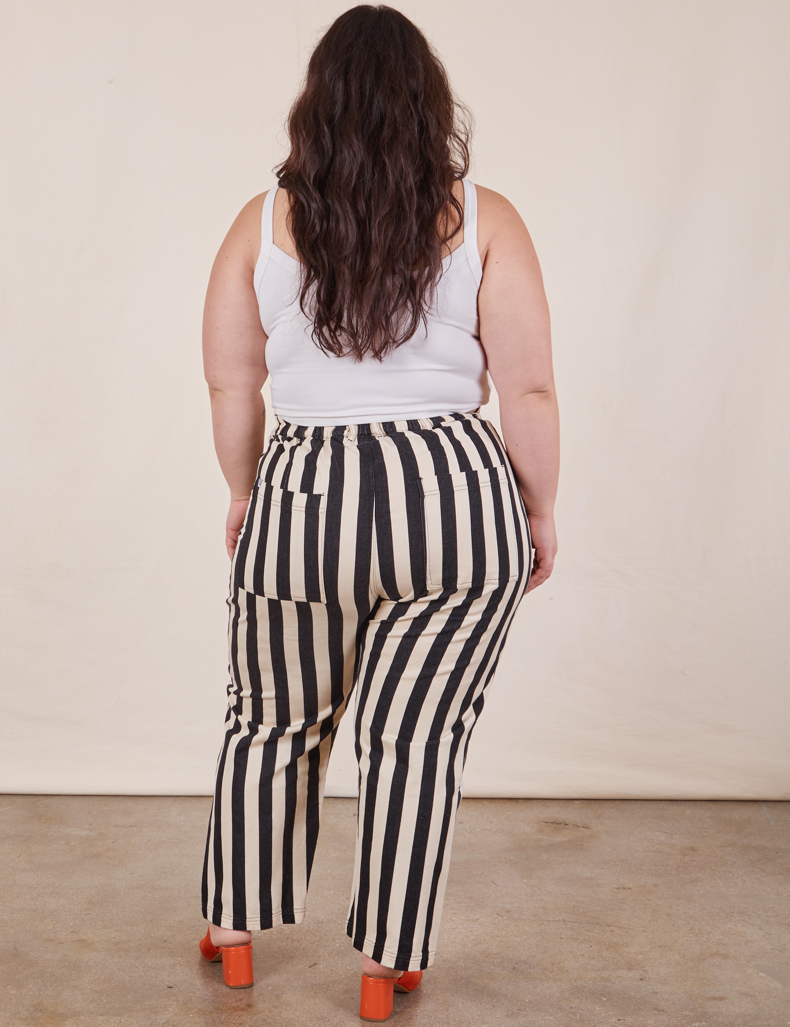 Back view of Petite Black Striped Work Pants in White on Ashley