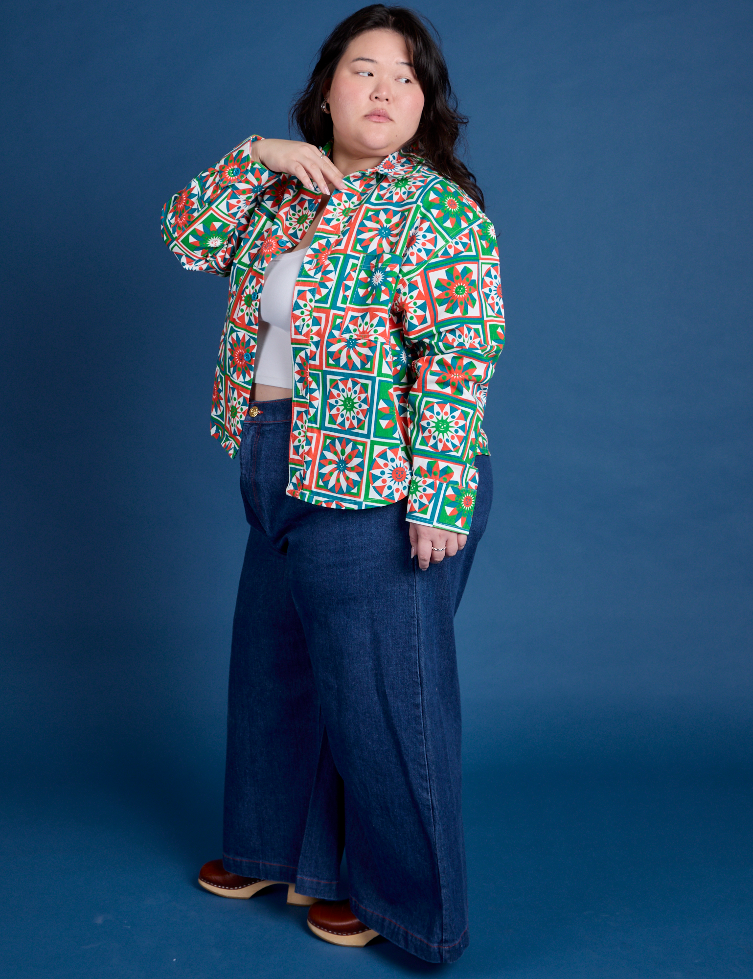 Side view of Cropped Overshirt in Quilt Print and dark wash Indigo Wide Leg Trousers