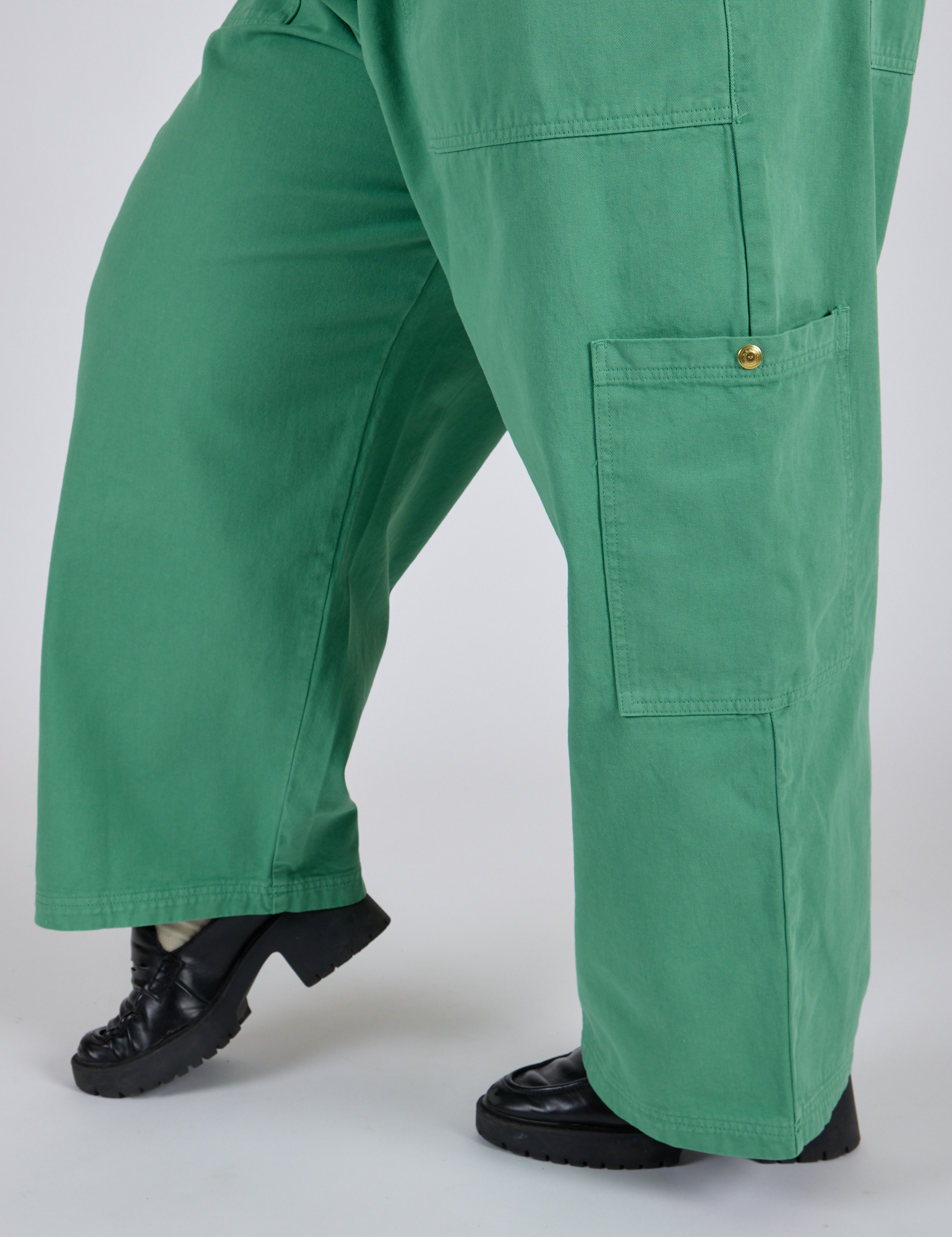 Close up side view of Drop Pocket Cargo Pants in Seafoam Green pant legs