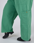 Close up side view of Drop Pocket Cargo Pants in Seafoam Green pant legs