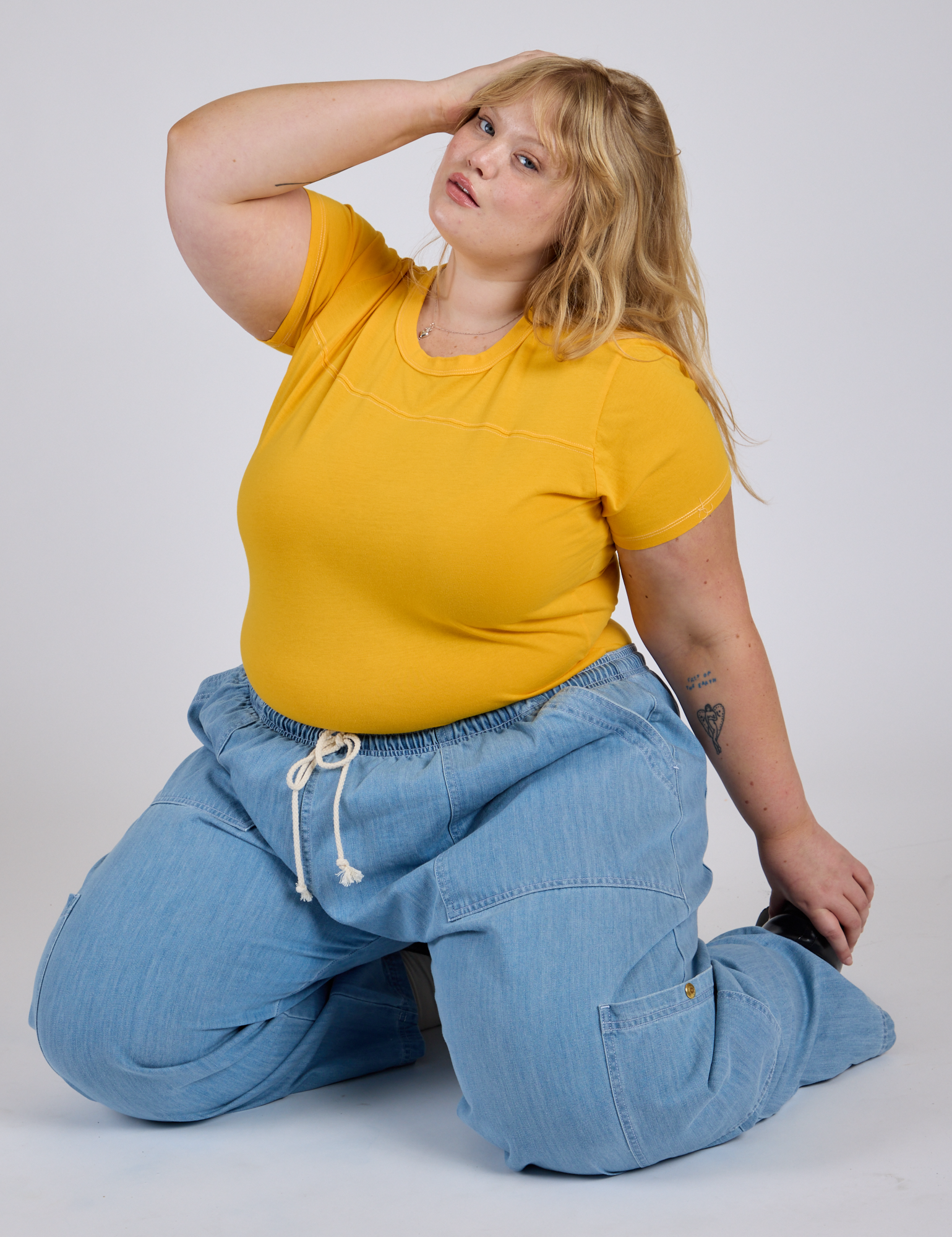 Jr. Varsity Tee in Sunshine Yellow and light wash Denim Drop Pocket Pants on Juliet