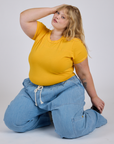 Jr. Varsity Tee in Sunshine Yellow and light wash Denim Drop Pocket Pants on Juliet