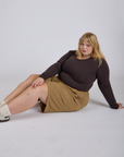 Longline Work Shorts in Desert Brown and espresso brown Long Sleeve. Baby Tee worn by Juliet