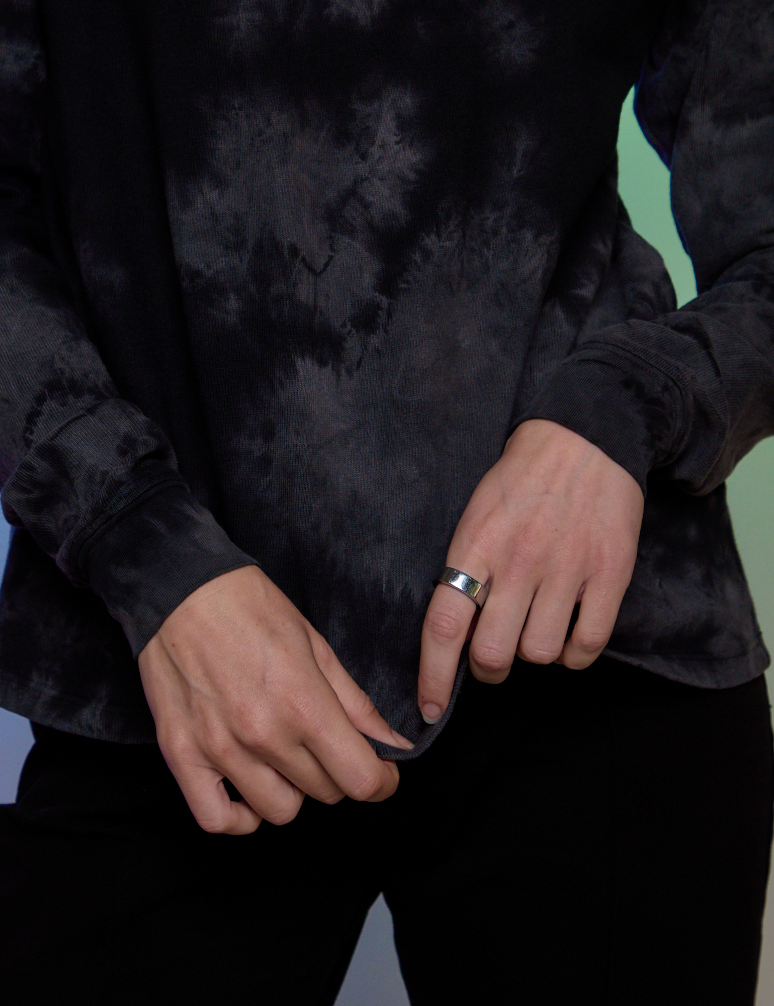 Magic Waters Long Sleeve Burly Tee in Black bottom close up on Alex