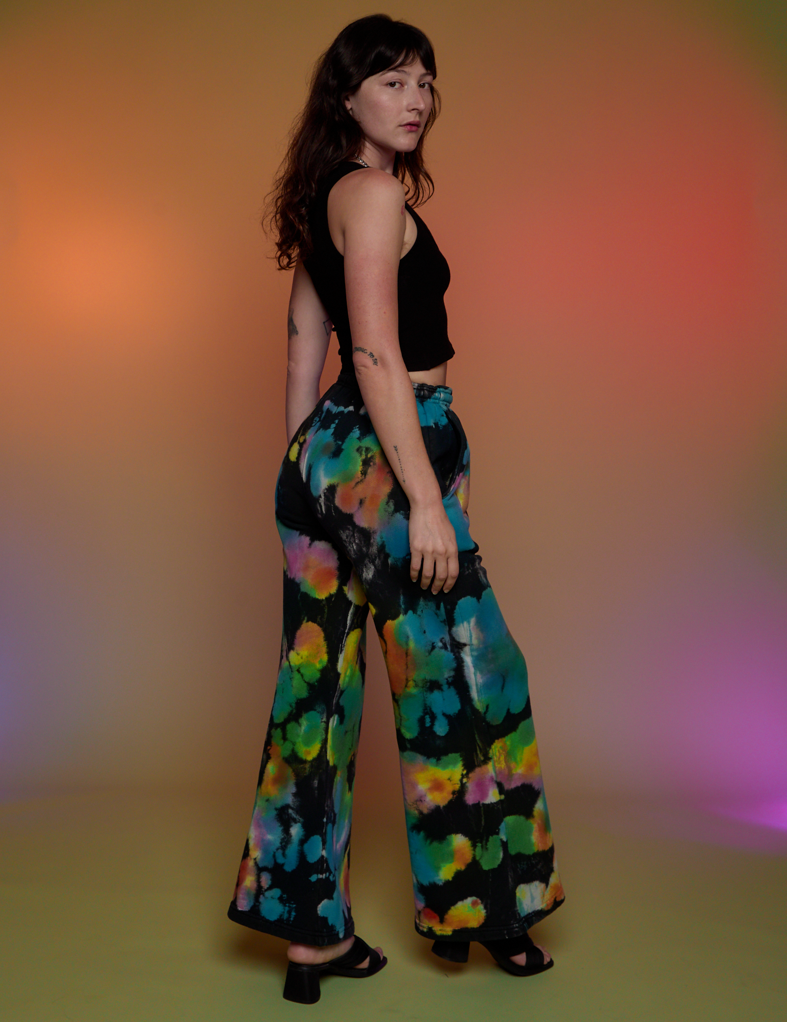 Angled back view of Tie Dyed Wide Leg Sweat Pants on Alex