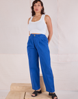 Tiara is wearing Heavyweight Trousers in Royal Blue and Cropped Tank in Vintage Tee Off-White