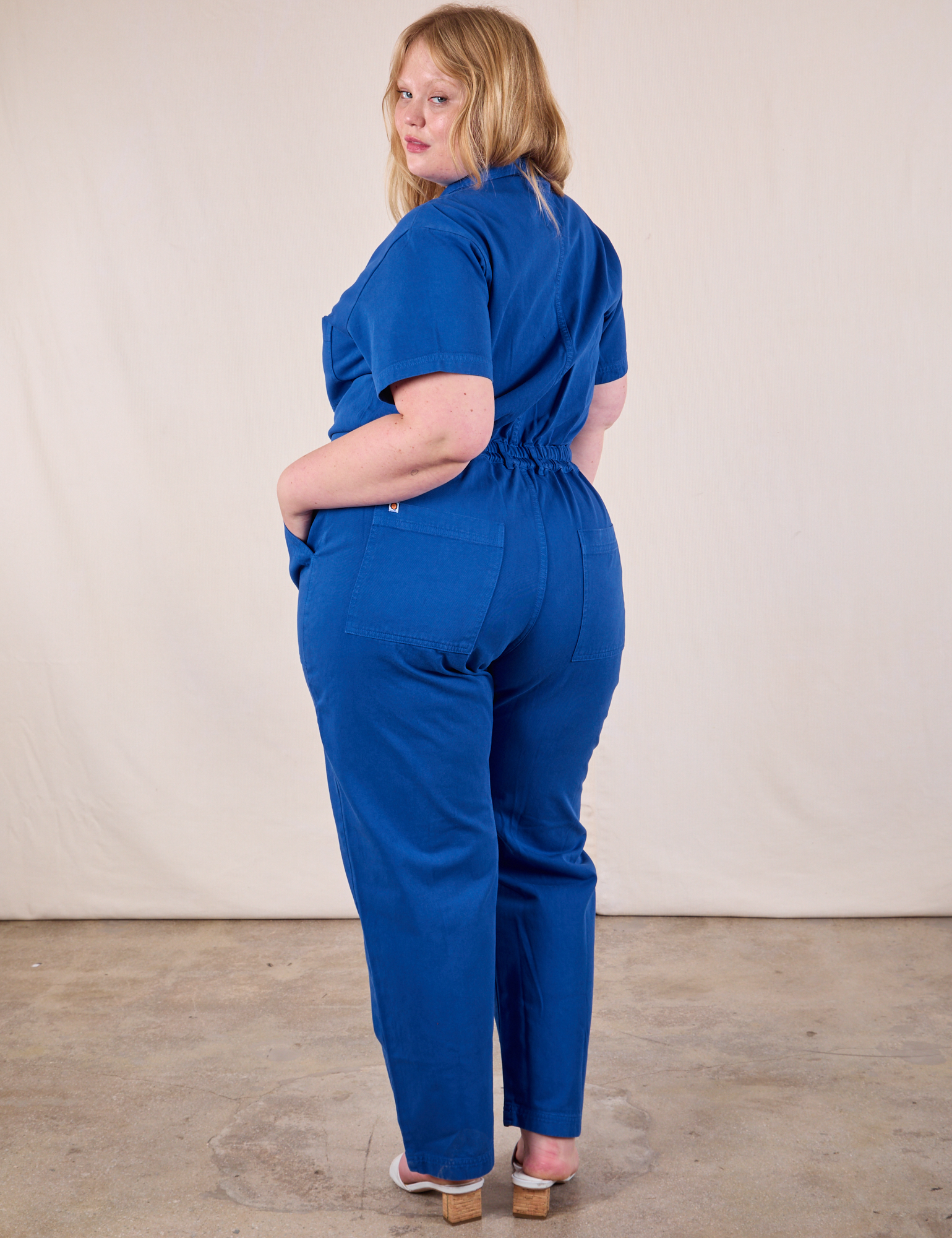 Short Sleeve Jumpsuit in Royal Blue back view on Juliet