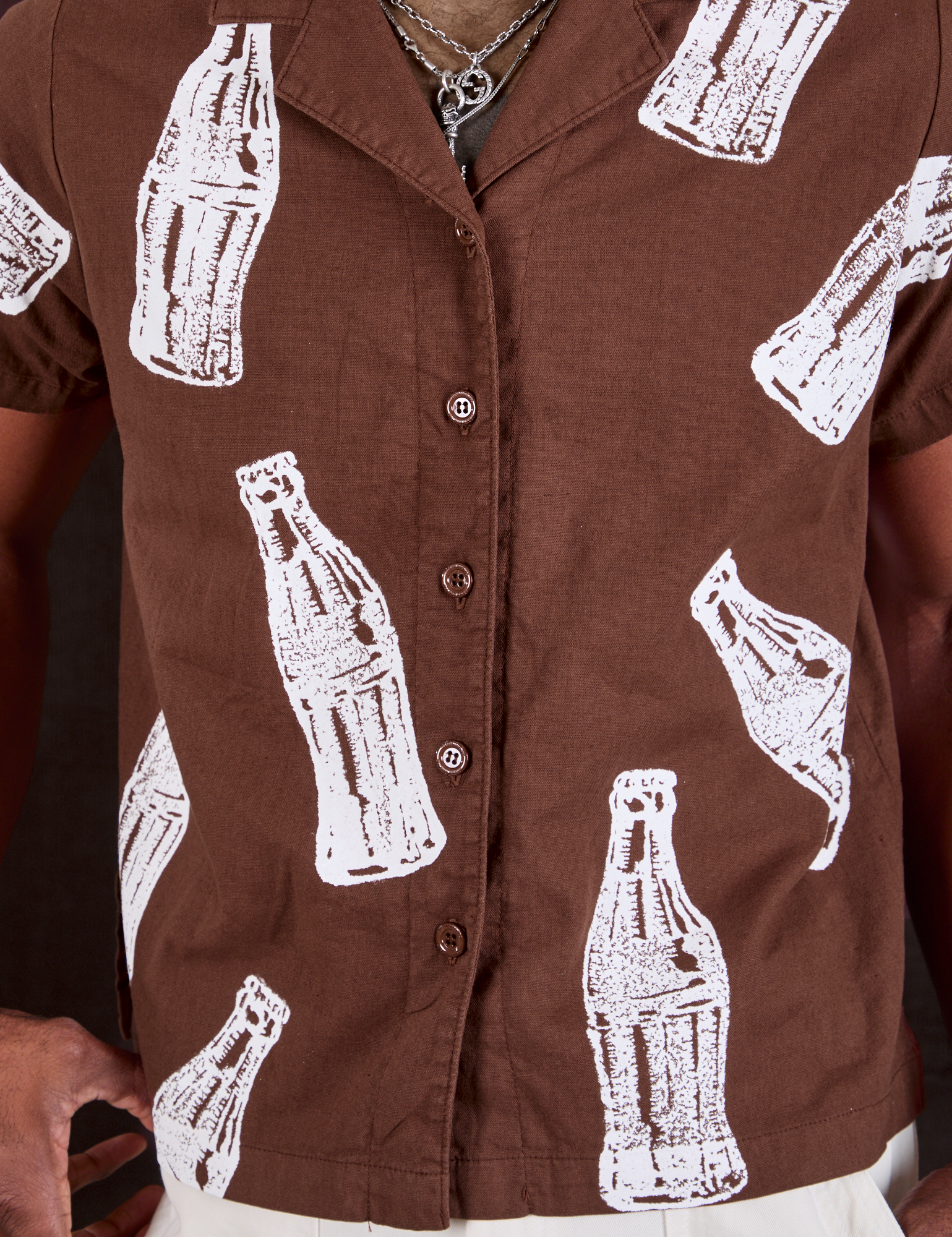 Soda Bottle Pantry Button-Up in Fudgesicle Brown front close up on Jerrod