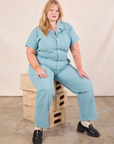 Juliet is wearing Short Sleeve Jumpsuit in Baby Blue