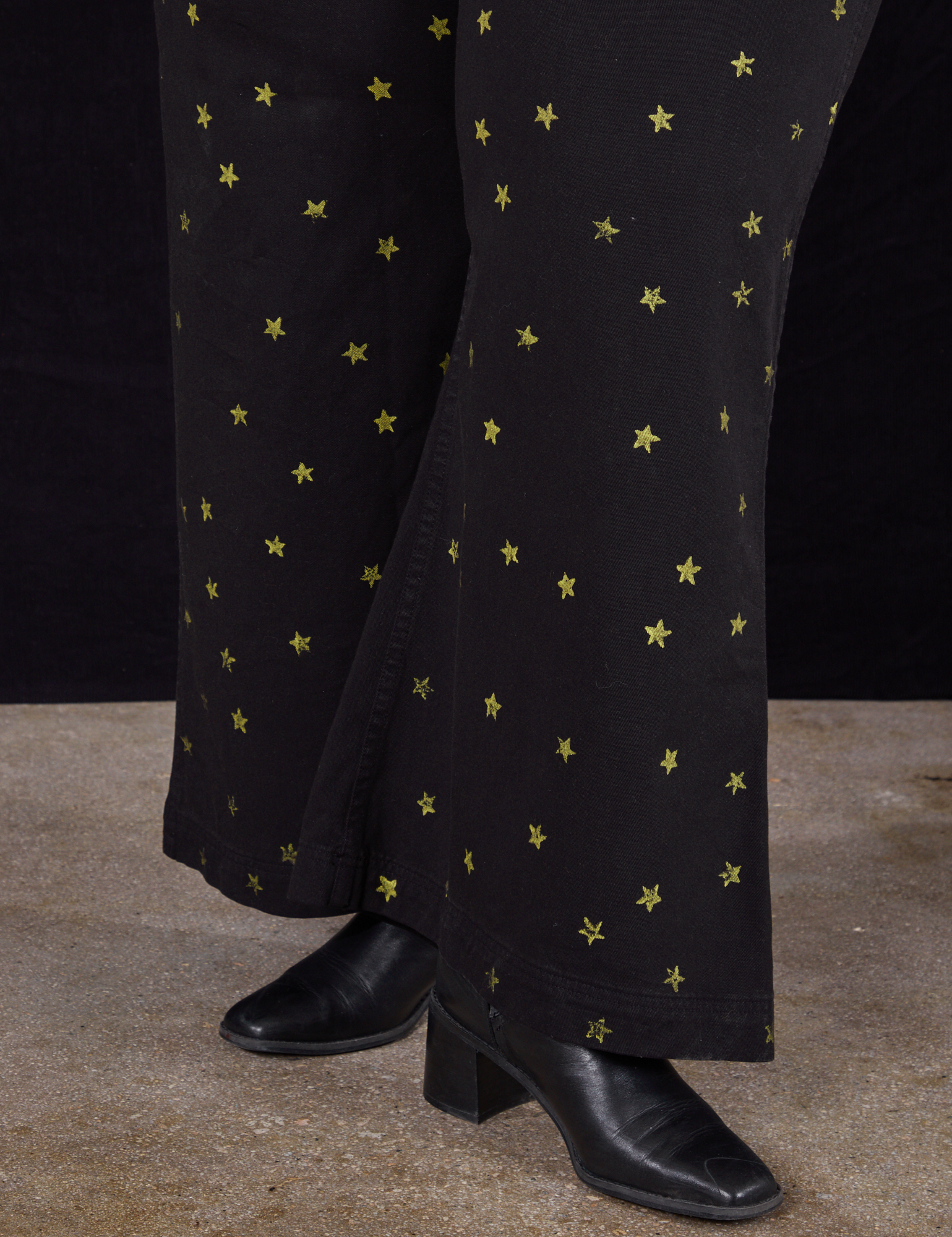 Star Bell Bottoms in Black pant leg close up on Morgan